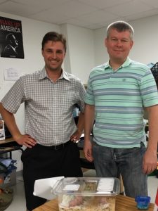 Image of Dmitry Ovcharenko with a coworker